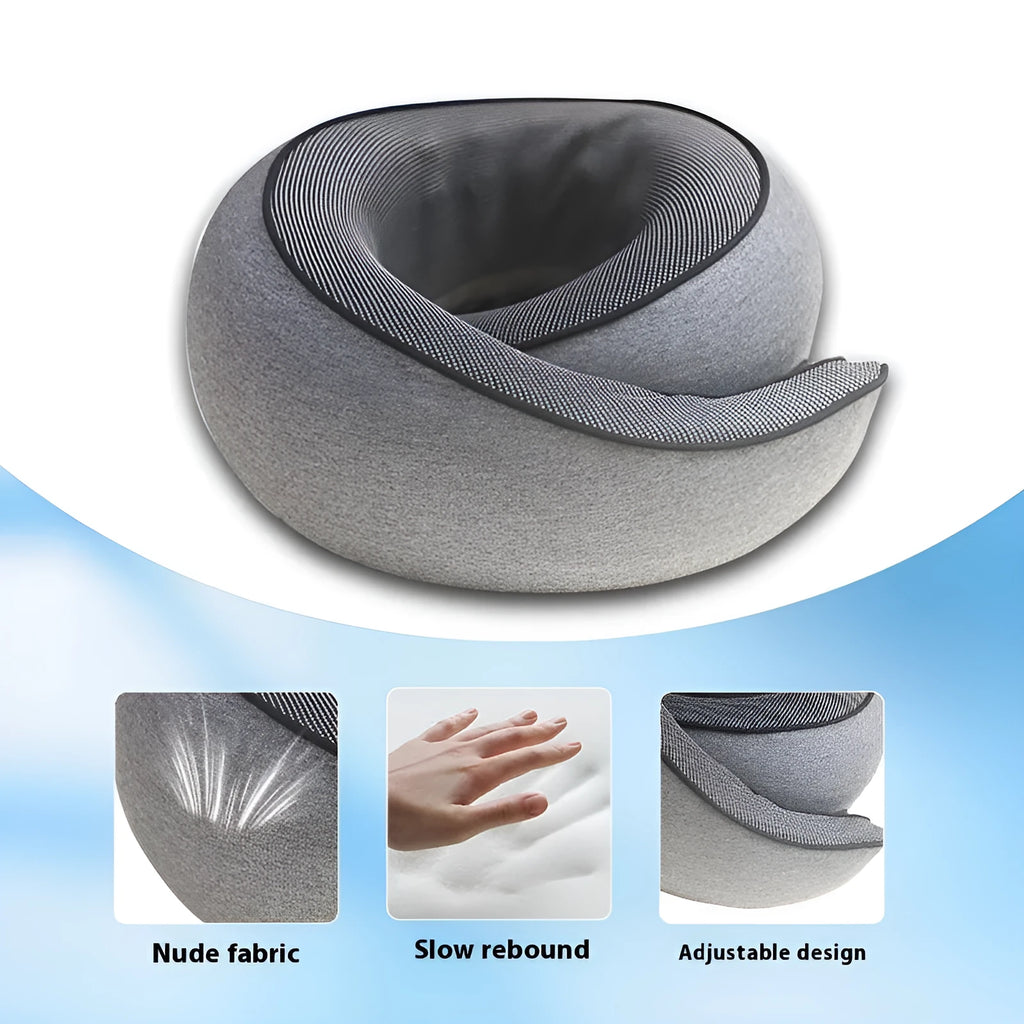 Black memory foam U-shaped travel neck pillow with a storage bag, shown for scale.