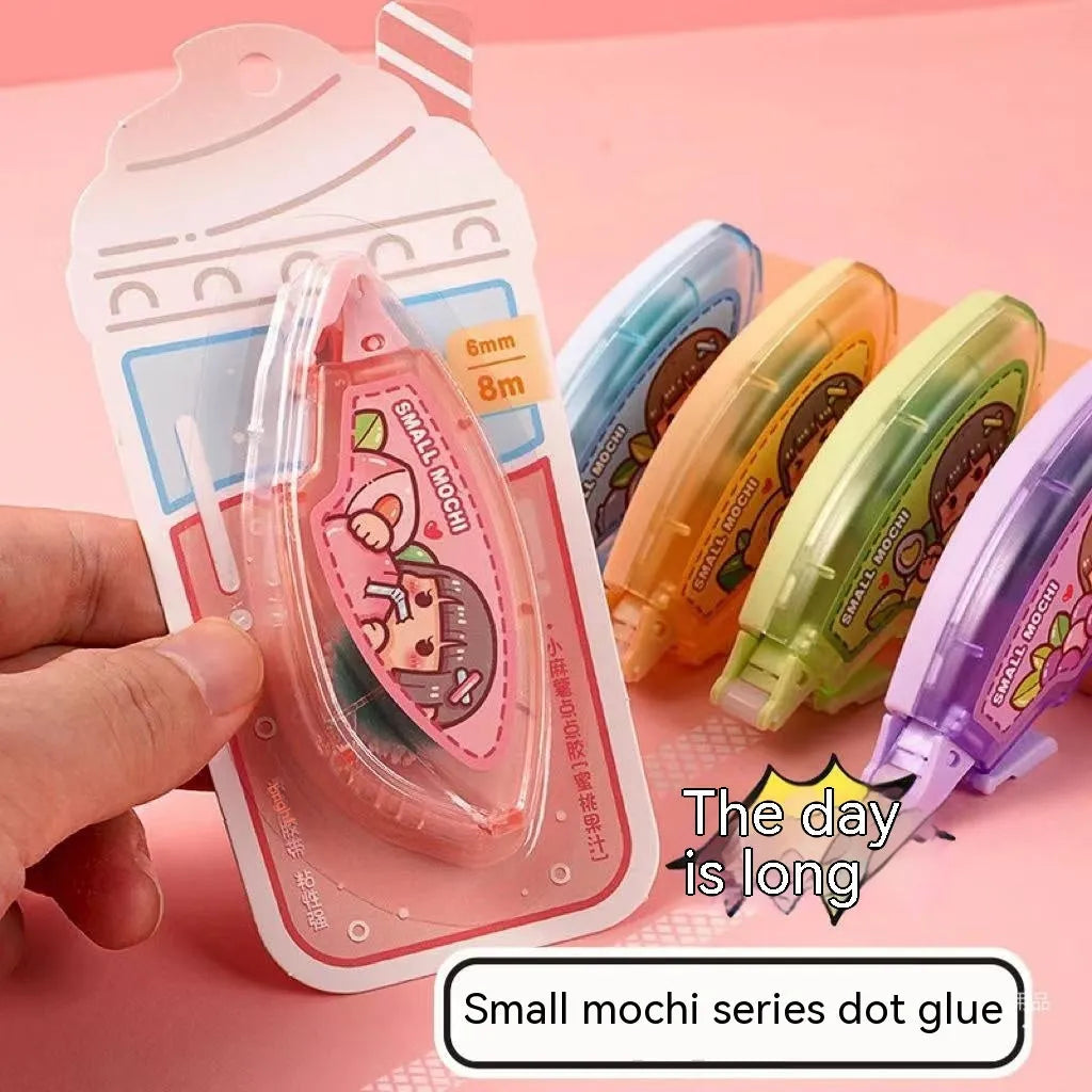 Card of colourful dotting glue double-sided adhesive dots in peach, lemon, blueberry, butter, and grape juice colours.