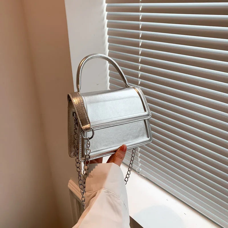 Retro PU leather crossbody bag in horizontal square shape with sewing line detailing