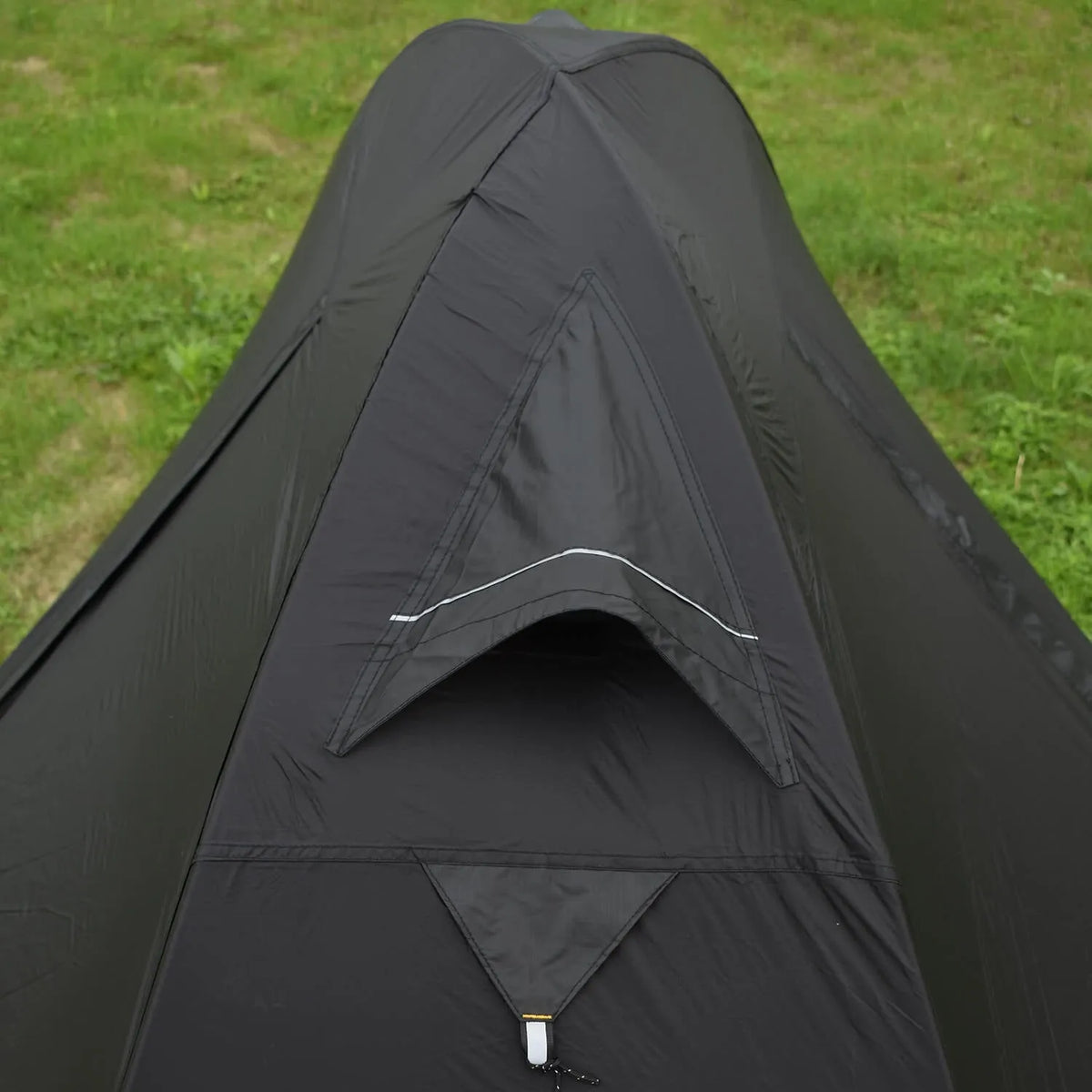 Single person hiking tent with aluminium poles in red colour, shown fully pitched with ventilation mesh visible.