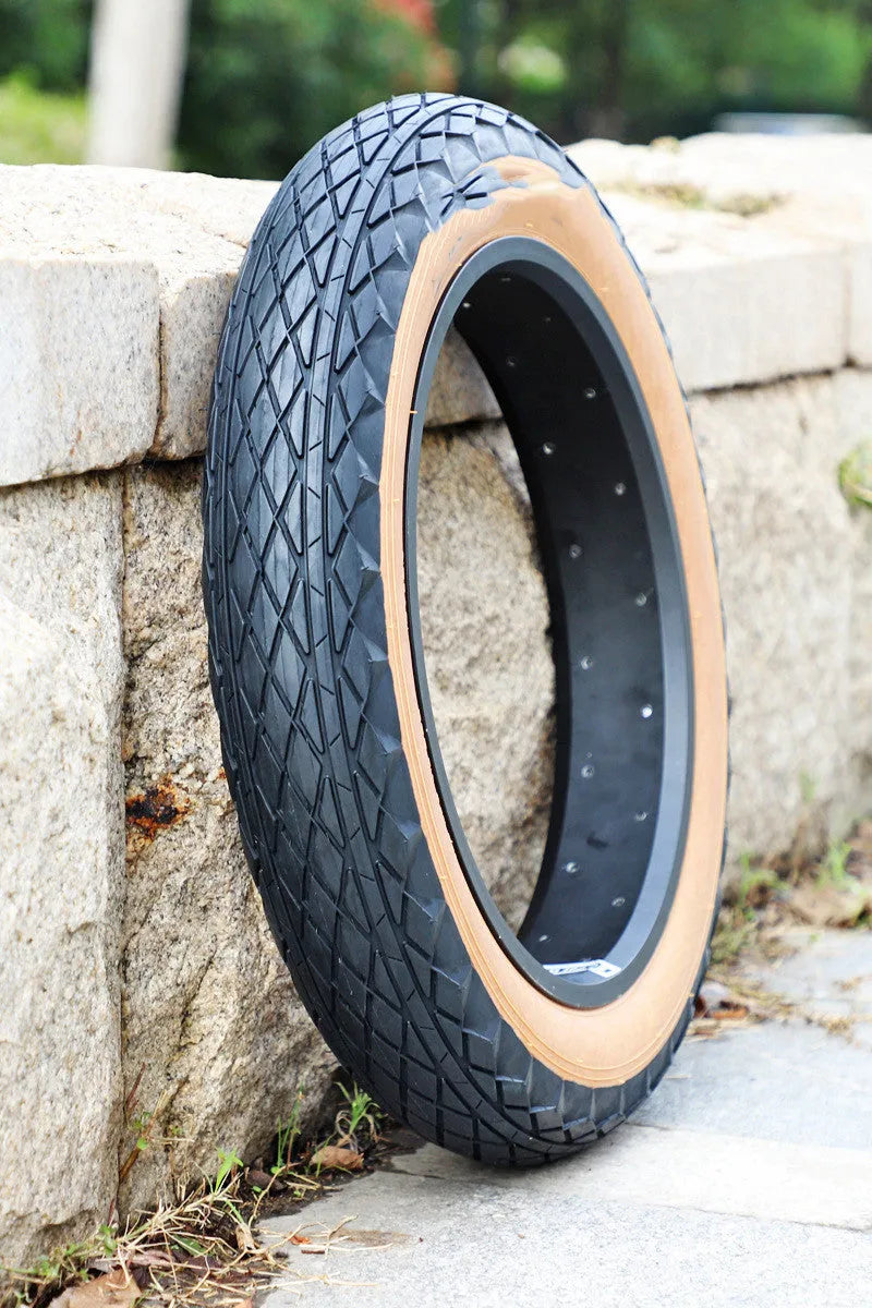 Brown sidewall snowmobile replacement tyre showing 20 inch diameter and 4.0 inch width tread