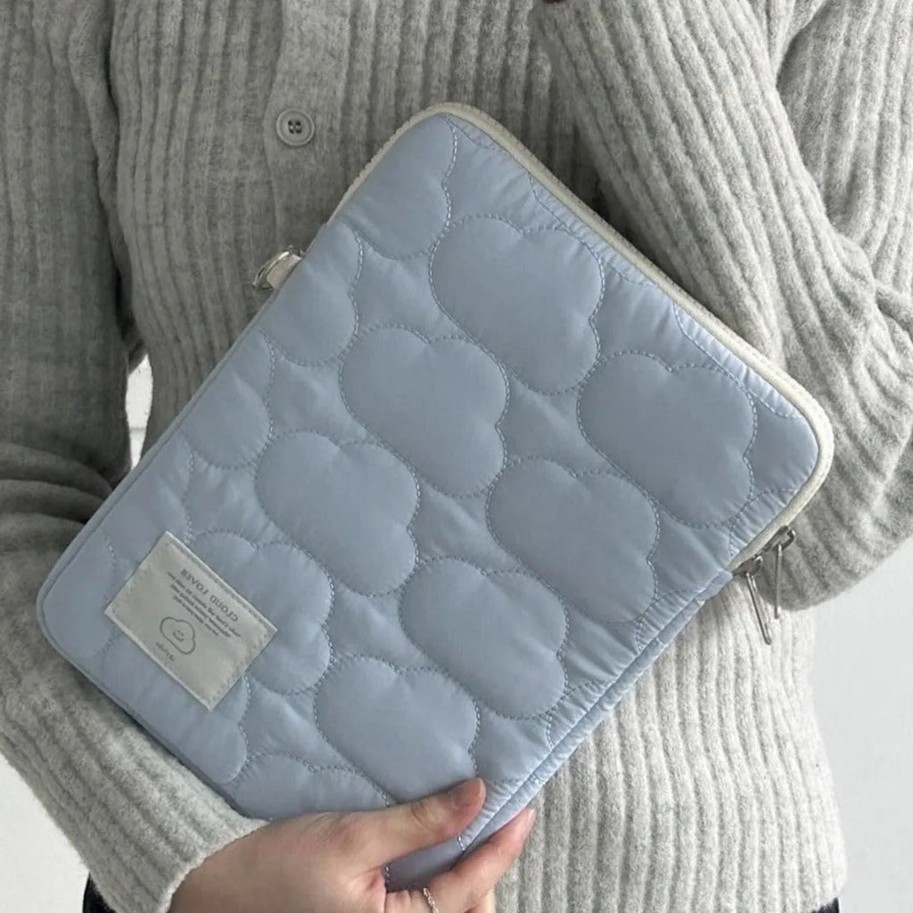 Cotton laptop sleeve with cloud embroidery in white or blue for 11 inch, 13-14 inch, and 15-15.6 inch devices.