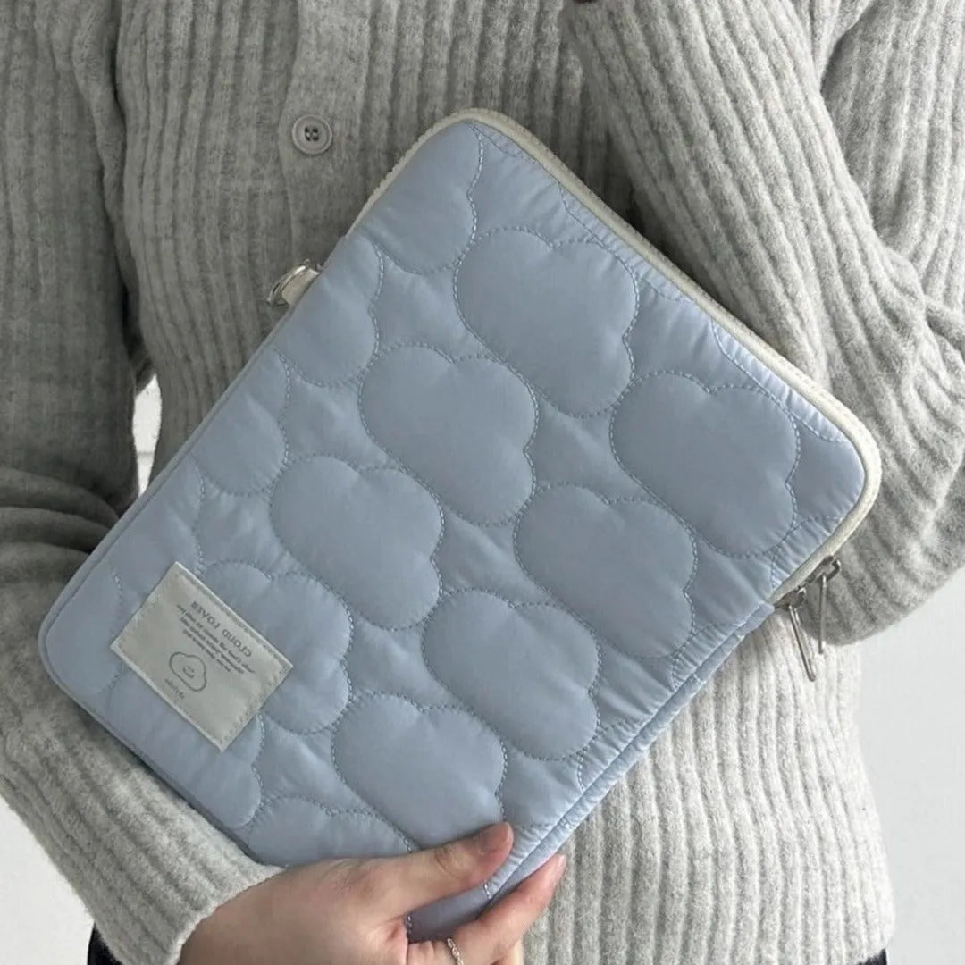 Cotton laptop sleeve with cloud embroidery in white or blue for 11 inch, 13-14 inch, and 15-15.6 inch devices.
