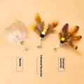 Three steel wire cat toy replacement heads with small flying insect designs for wand attachment