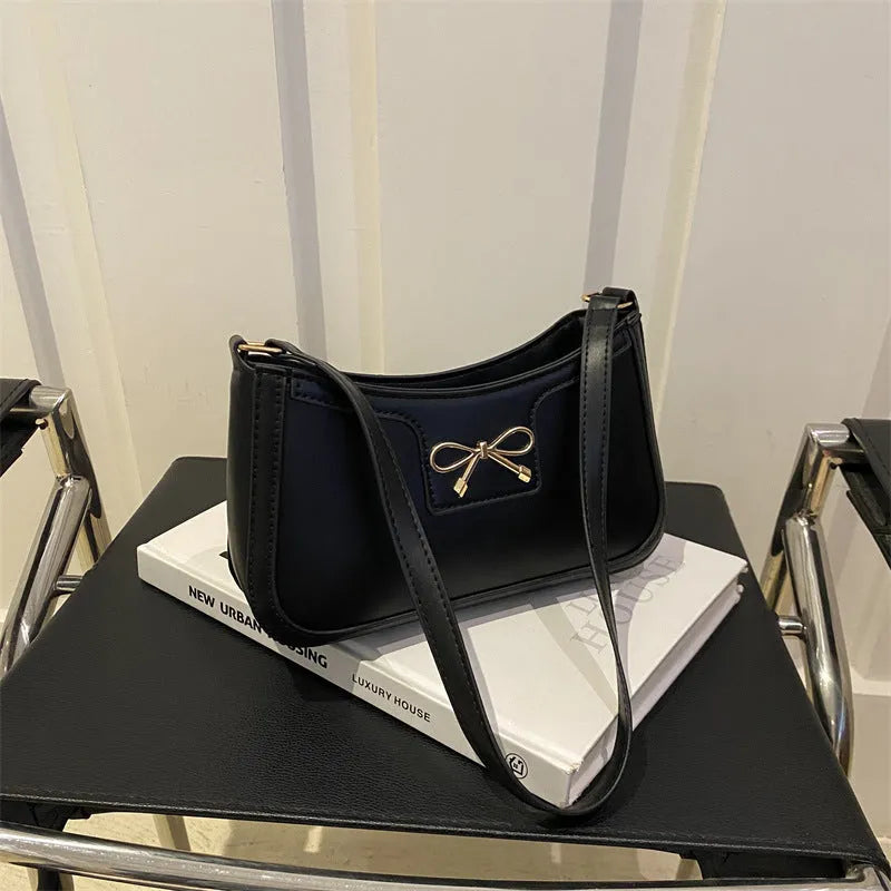 PU leather western style baguette shoulder bag with bow detail in horizontal square silhouette