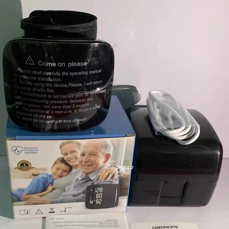 Black wrist blood pressure monitor with USB rechargeable port and digital display