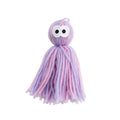 Hanging wool ball cat toy with teaser stick in pink and blue colours on a white background.