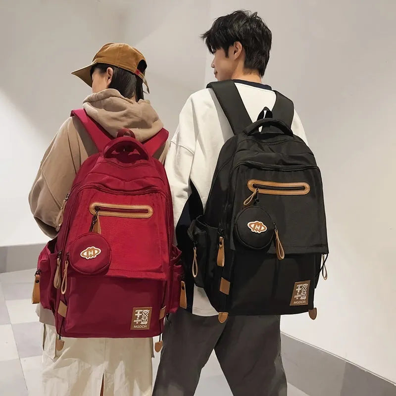 Large nylon school backpack for middle school students in multiple colour options.