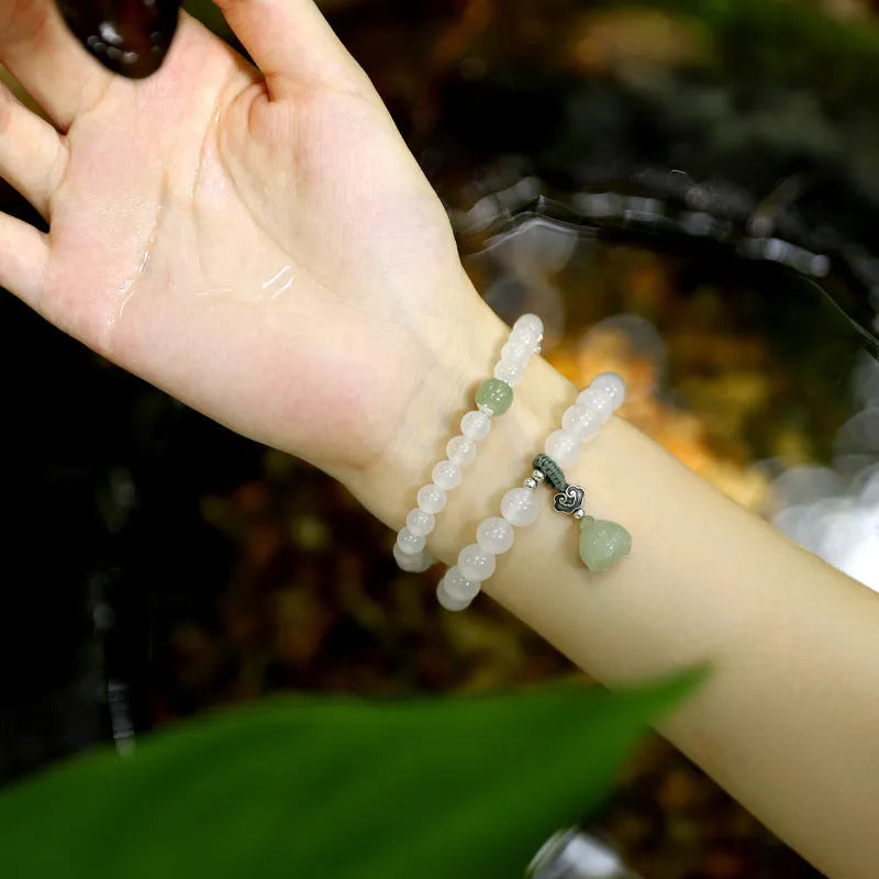 S925 silver bracelet with white agate and Hetian jade stones in geometric lotus design