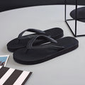 Deodorant rubber beach flip-flops with fish label design in black, blue, green, and red colour options