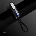 Black magnetic three-in-one USB phone charging cable showing magnetic connector and 40 cm length.