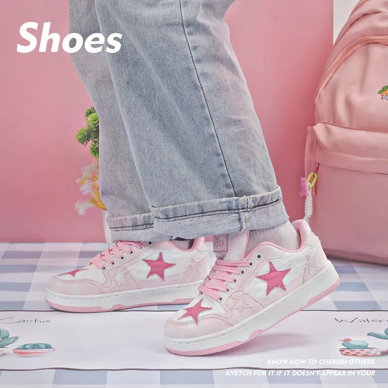 A pair of denim skateboard shoes with a flat rubber sole and lace-up front, shown in a solid colour.