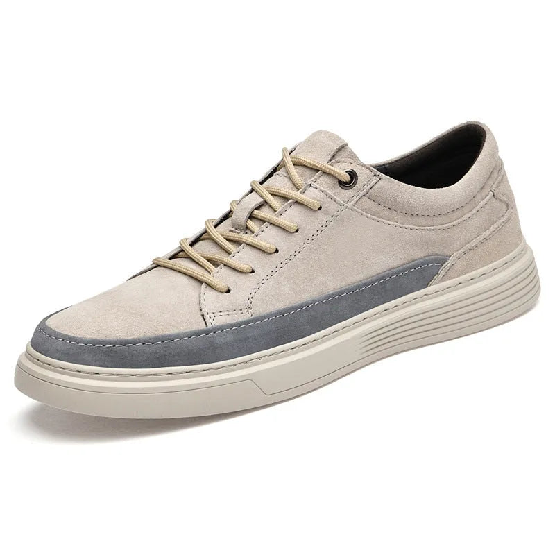 Men's grey casual leather skate shoes with round toe and lace-up front on a rubber sole.