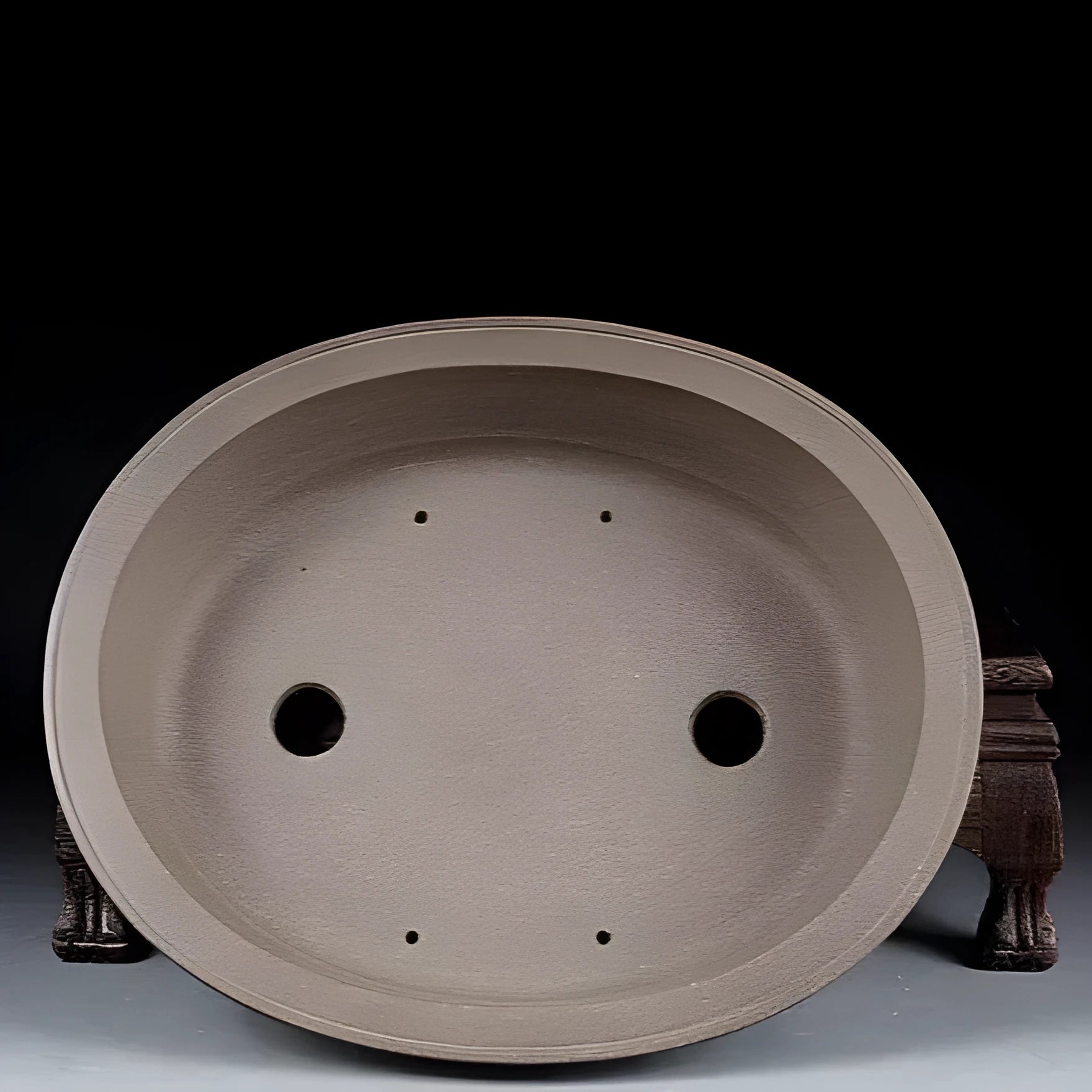 Handmade purple sand ceramic bonsai pot with antique oval design measuring 25x21x6.3cm