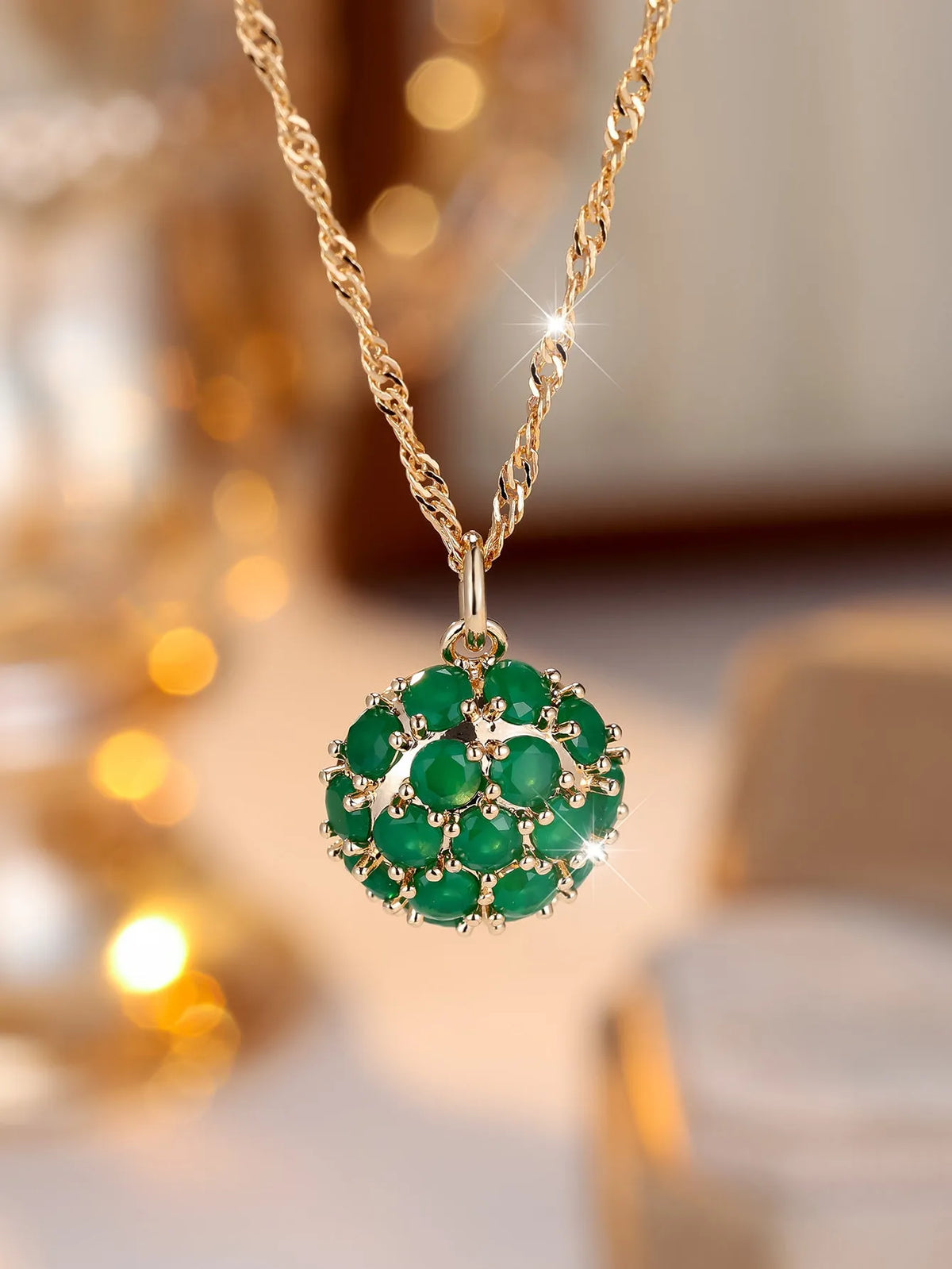 Round green jade pendant with diamond setting on champagne gold chain necklace