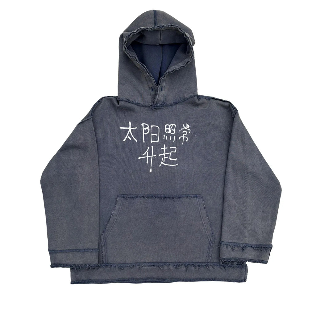 Man wearing a dark blue full zip hoodie sweater.
