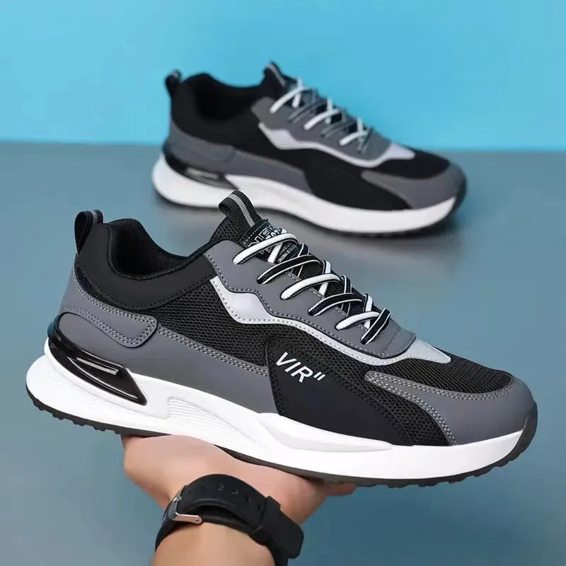 Men's colour block mesh lace-up running shoes in black, grey and white on a white background.