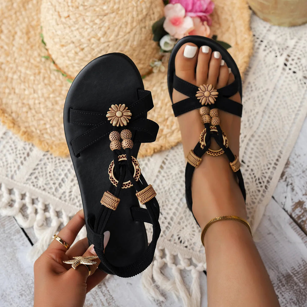 Black women's ethnic beaded weave open toe beach sandals with elastic band and decorative rhinestones