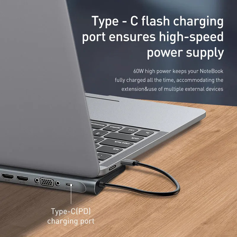 Grey aluminium ten-port USB hub docking station with cooling bracket on a desk.