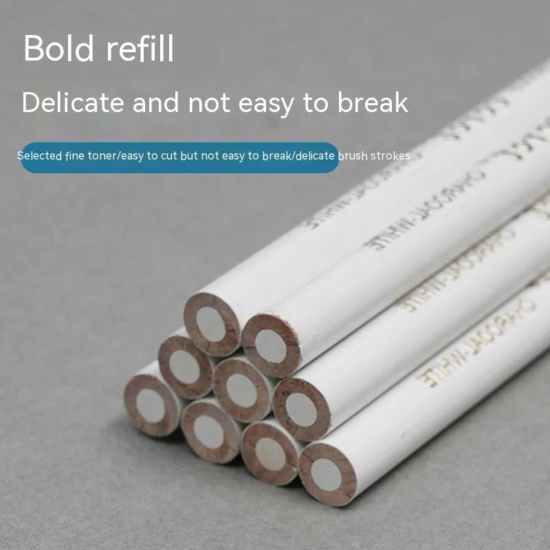 Three white charcoal drawing pencils with wooden barrels for sketching and highlighting