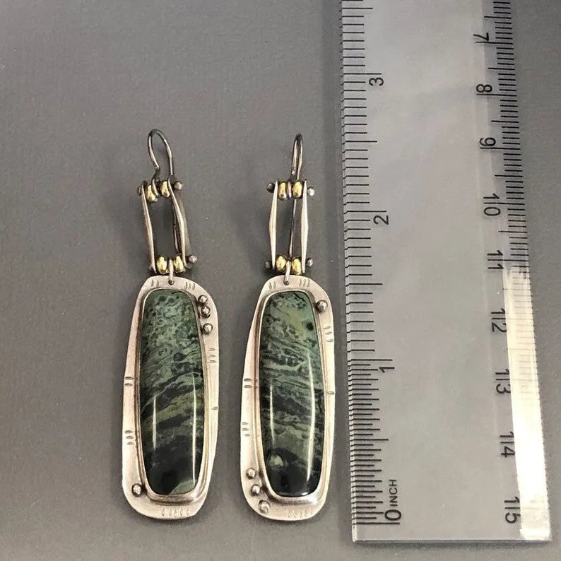 Geometric alloy earrings with two-tone marble pattern design