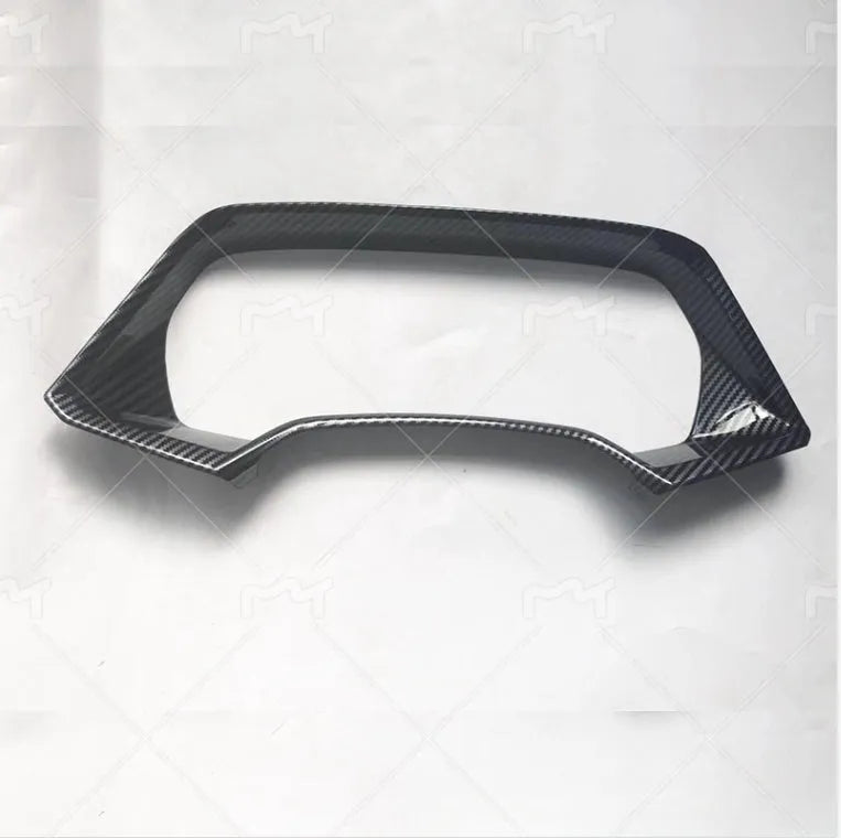 BMW X5 dashboard decorative frame in Peach Wood and Carbon Fiber finishes with double-sided adhesive tape