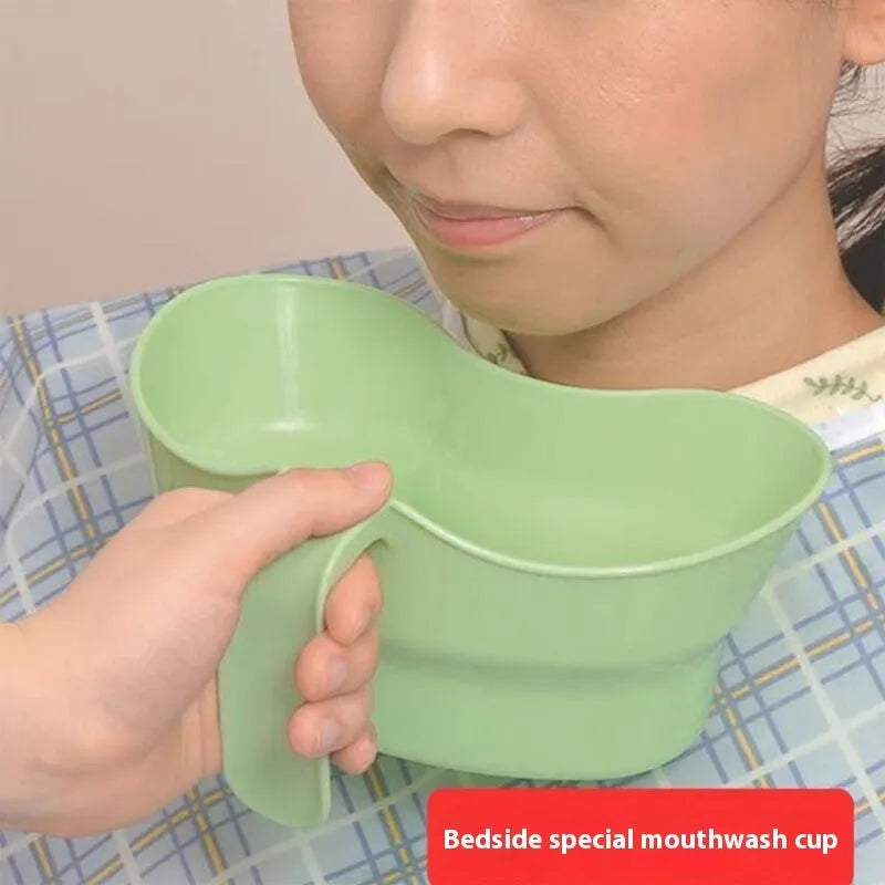 Green plastic gargle cup for bedridden elderly nursing care with modern simplicity design