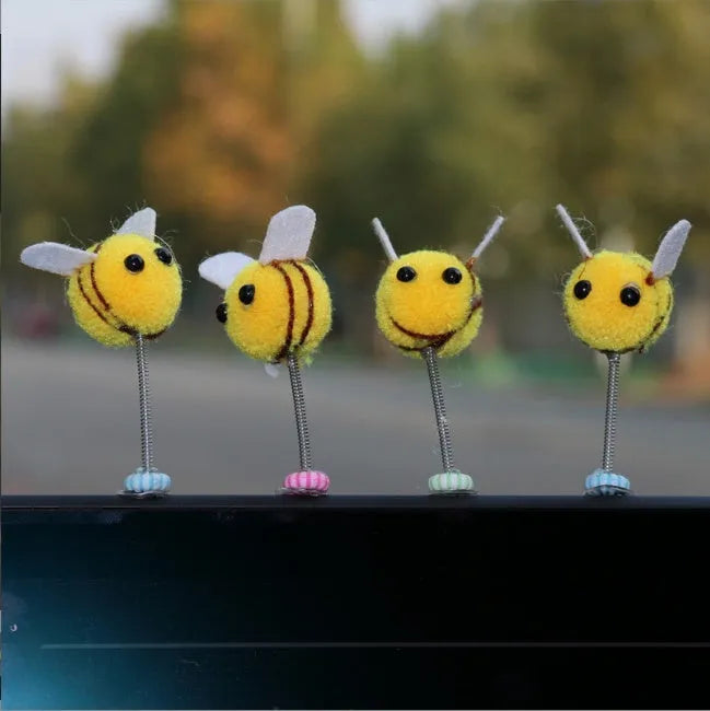 Swing Spring Bee car decoration showing a small, soft fur ball bee on a 3cm by 3cm scale.