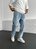 Men's blue straight-leg loose wide-leg denim jeans on a neutral background