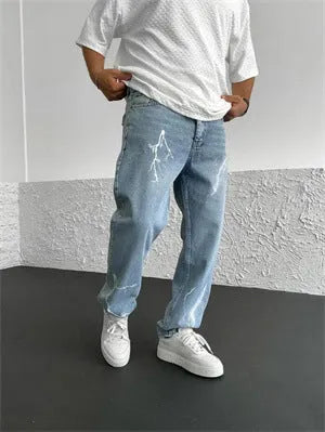 Men's blue straight-leg loose wide-leg denim jeans on a neutral background
