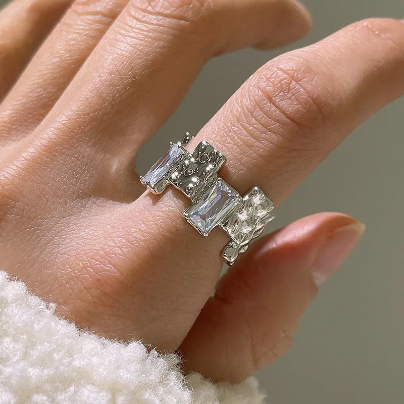 Geometric open silver ring with cross zircon decoration in retro style