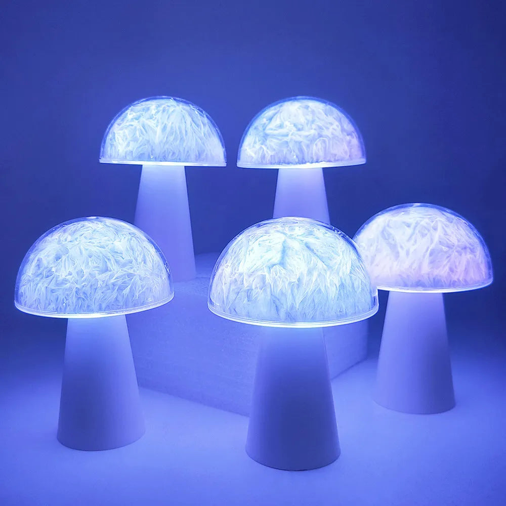 Mushroom-shaped RGB colour-changing ambience light with remote control on wooden surface