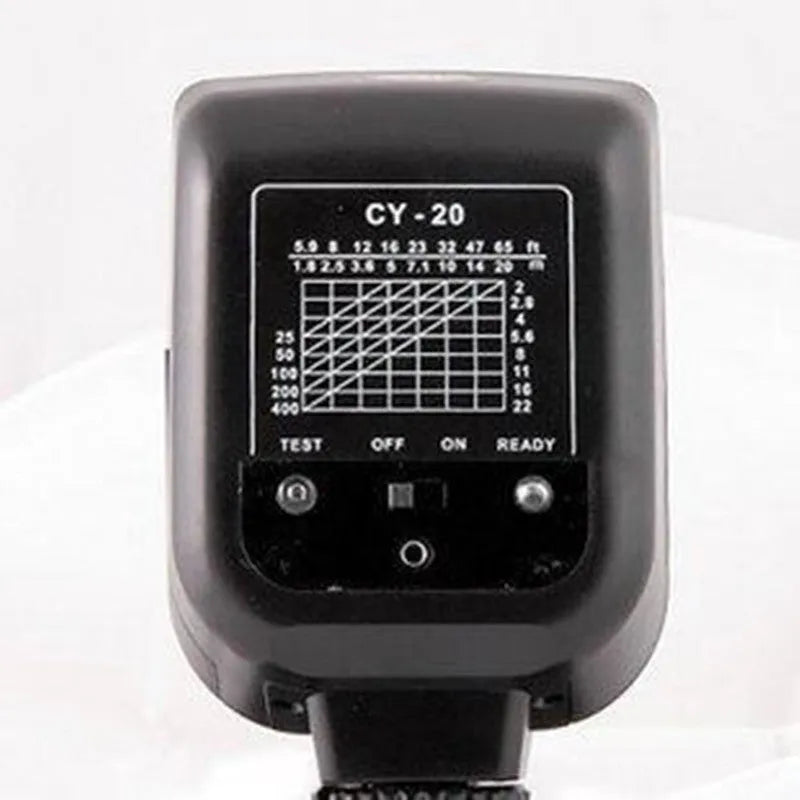 Compact black hot shoe camera flash unit with a head rotated upwards for bounce lighting.