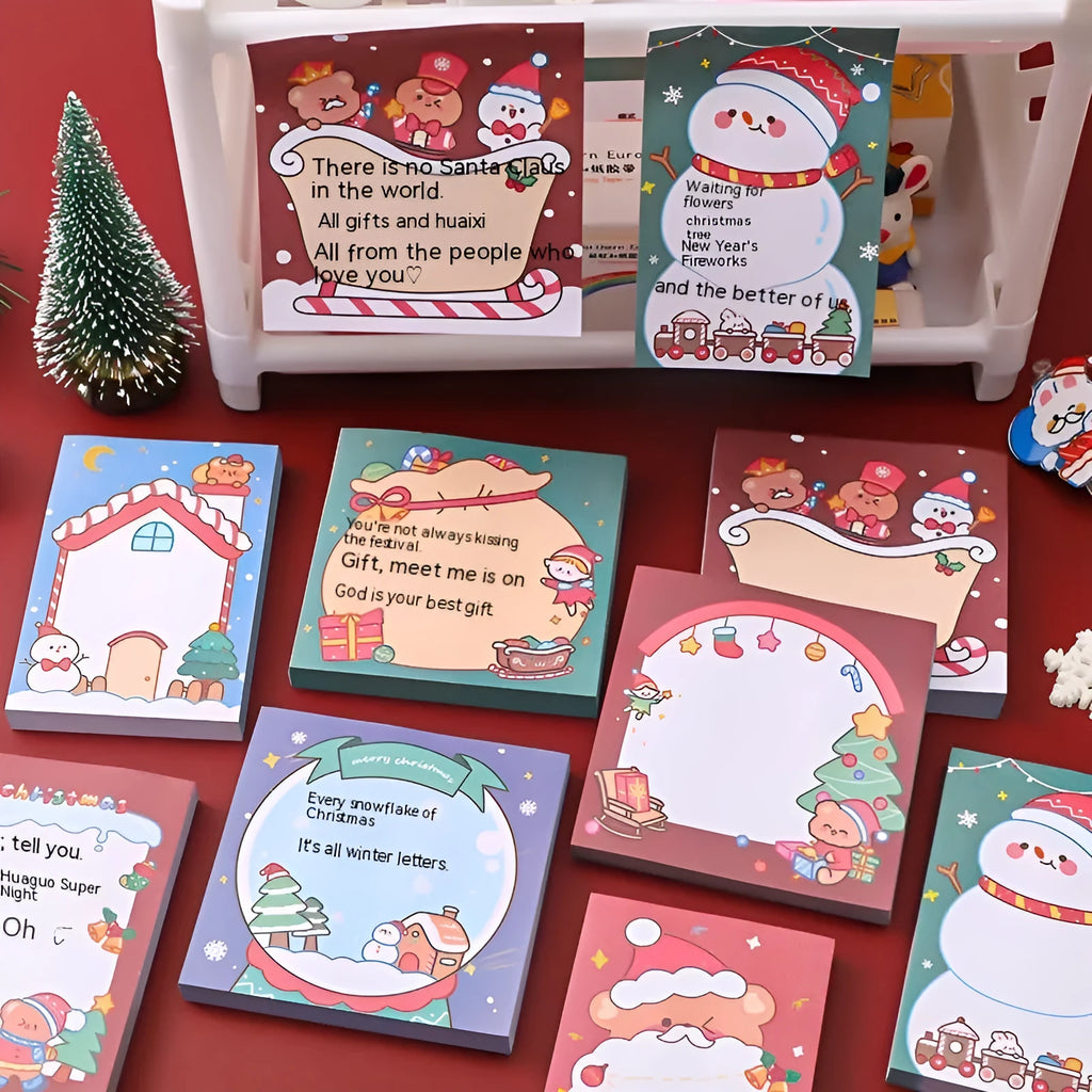 Christmas cartoon sticky notes set with Santa Claus, Elf, Snowman, Gift, Sled, House, Crystal Ball, and Christmas Bear designs