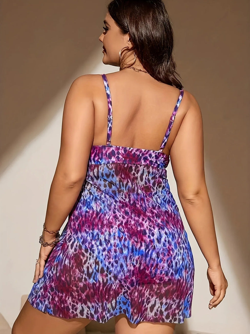 Plus size women's bikini set with a sleeveless top and a split skirt in a choice of colours.