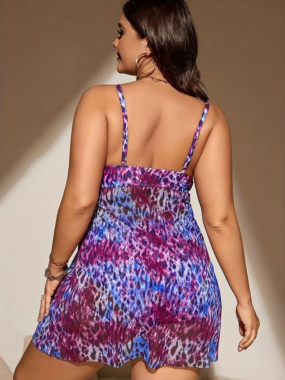 Plus size women's bikini set with a sleeveless top and a split skirt in a choice of colours.