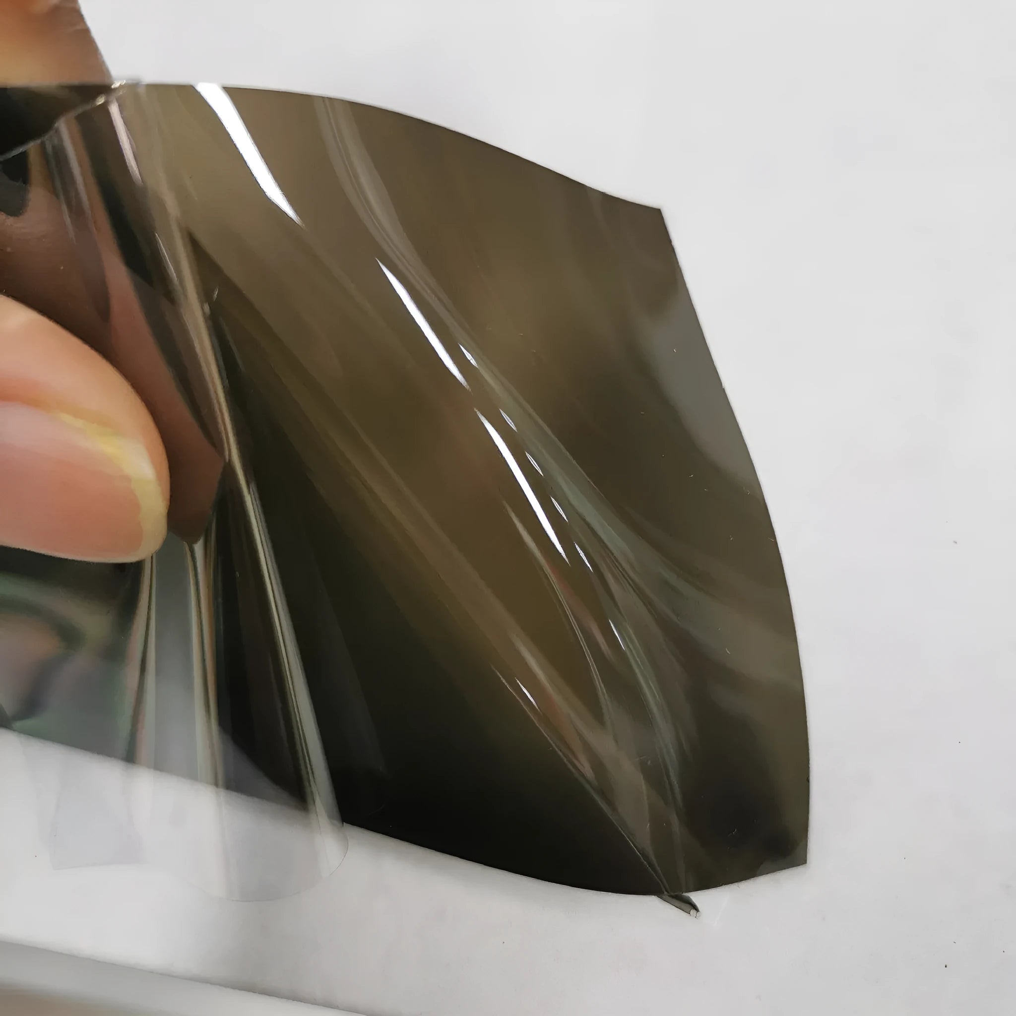 Roll of 30cm wide protective film for large LED car lampshades, showing PVC and TPU material options.