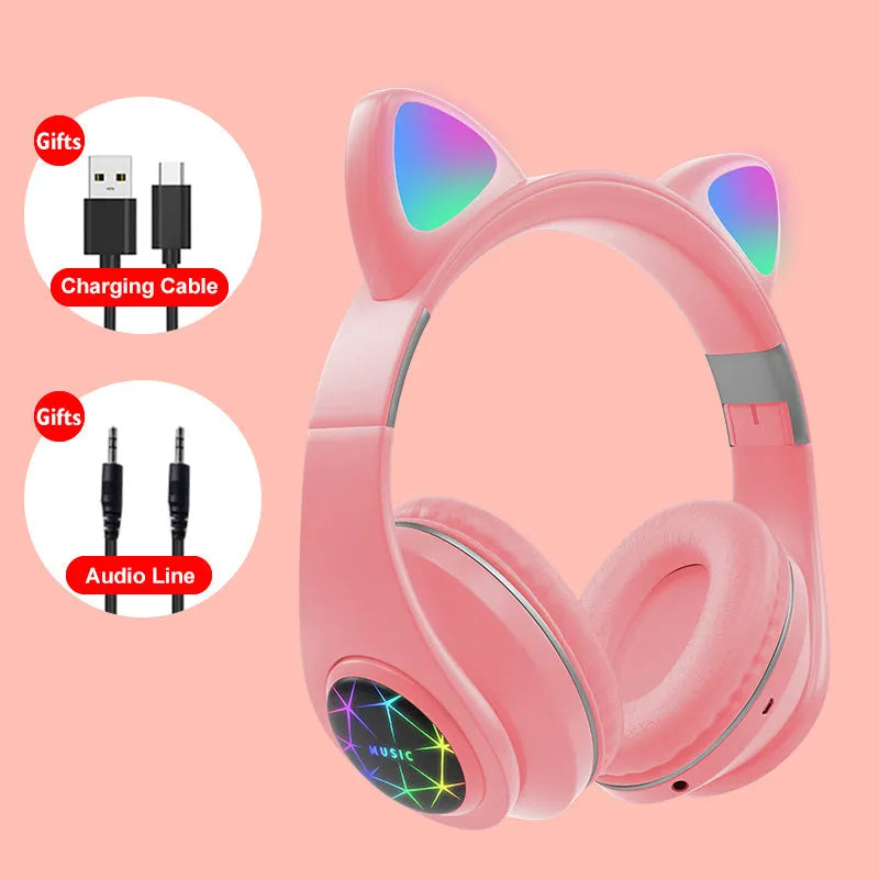 Colourful cat ear style wireless Bluetooth sports headset with a headband, shown in pink.