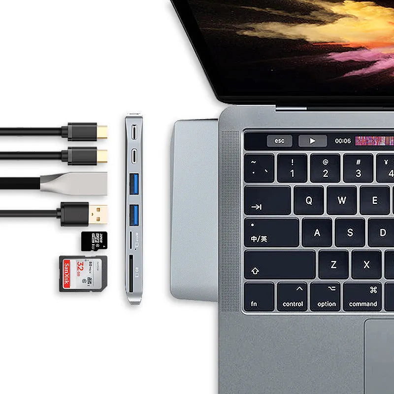 Space grey 8-in-1 USB-C hub for MacBook Pro with dual card readers and HDMI port