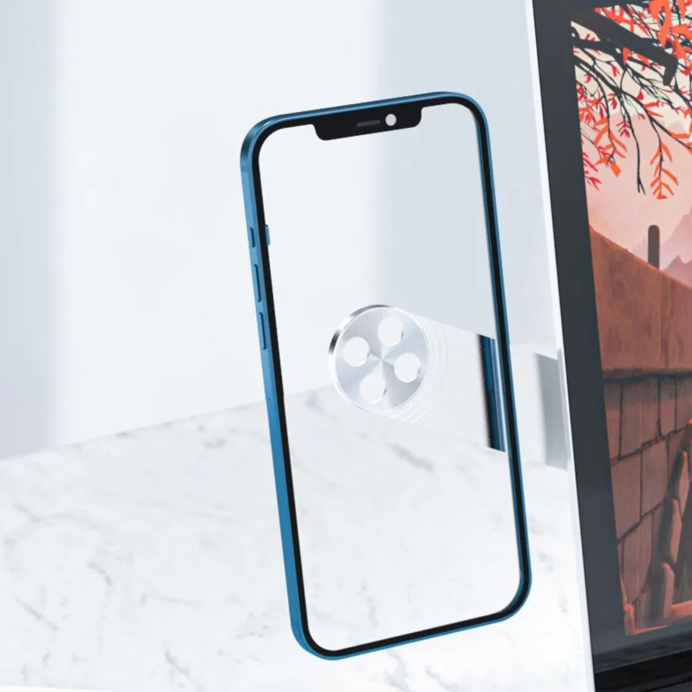 Black aluminium magnetic phone holder clipped to the side of a silver laptop.