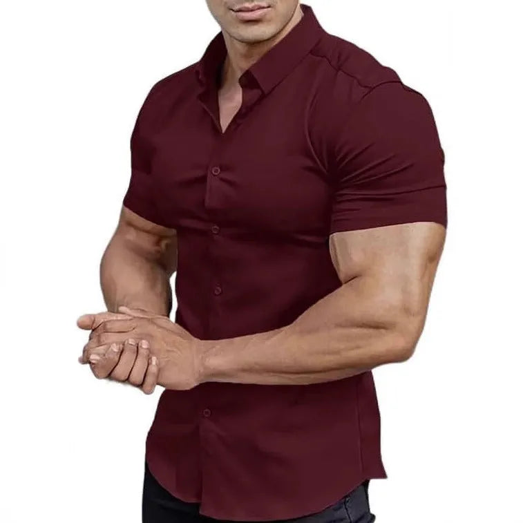Man wearing a brown short sleeve printed casual shirt with a shirt collar.
