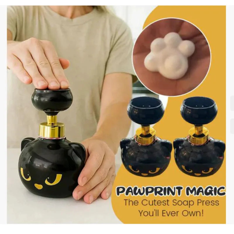 Black cartoon cat shaped plastic foam soap dispenser on bathroom counter