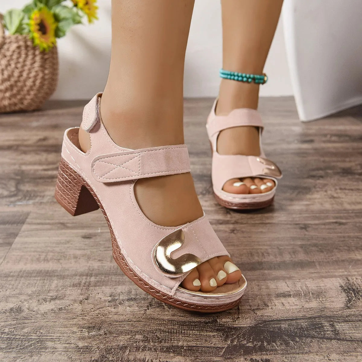 Light brown Roman sandals with adjustable hook-and-loop strap and rubber sole
