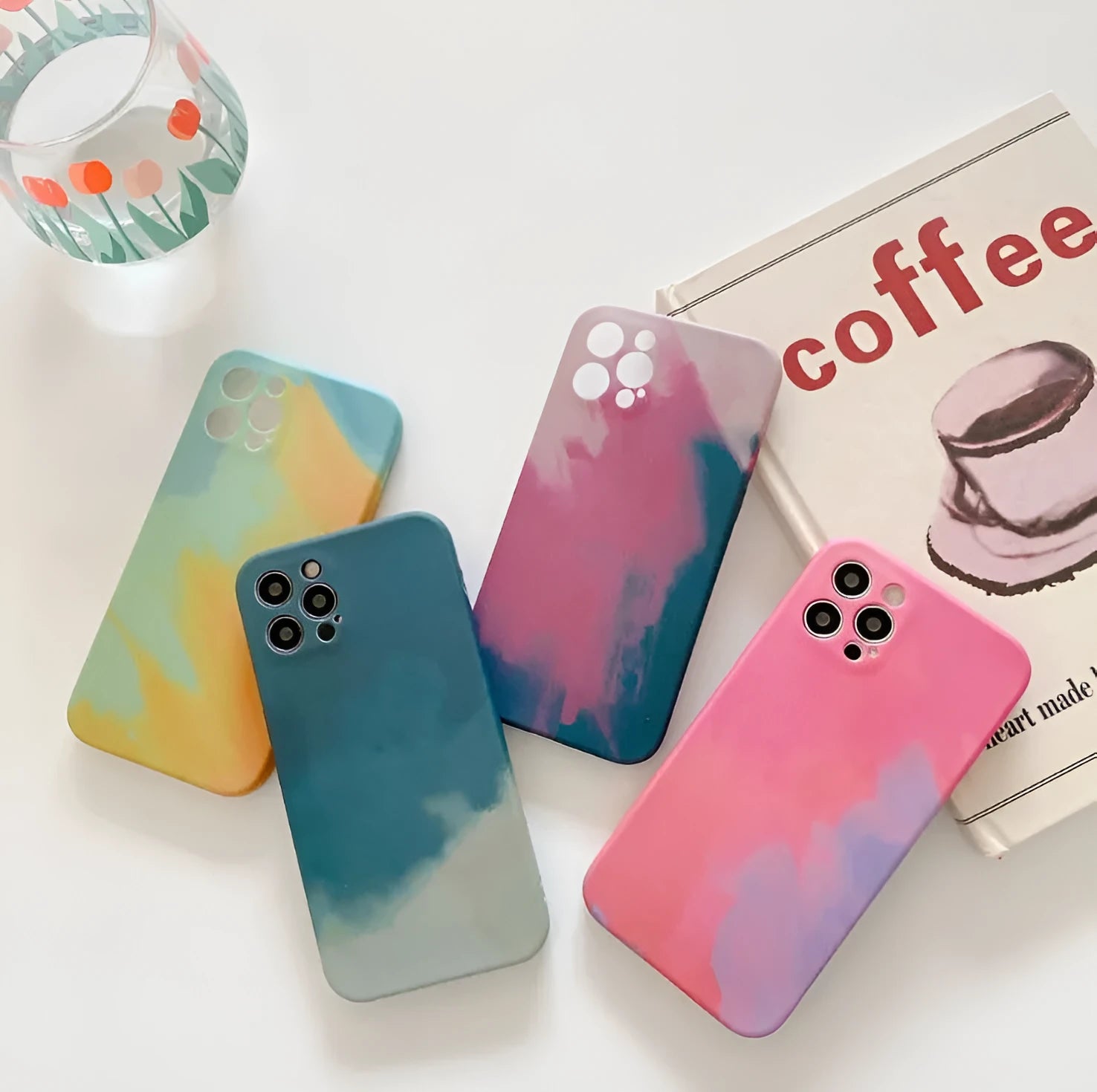 Soft silicone phone case with oil painting gradient geometry abstract design in blue, green, pink, or purple for iPhone.
