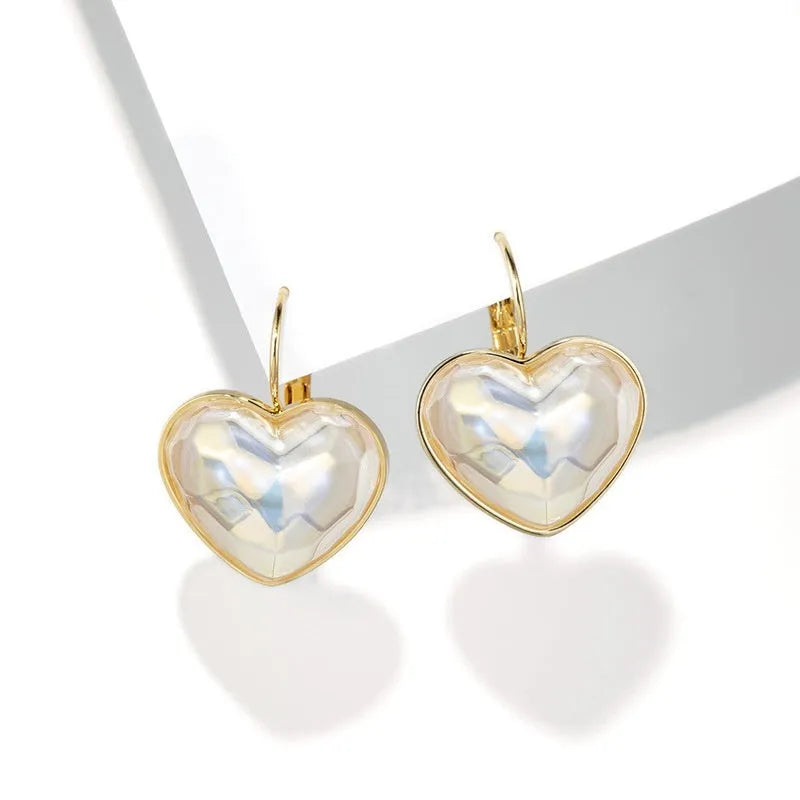 Gold coloured clip-on earrings for women with alloy metal construction