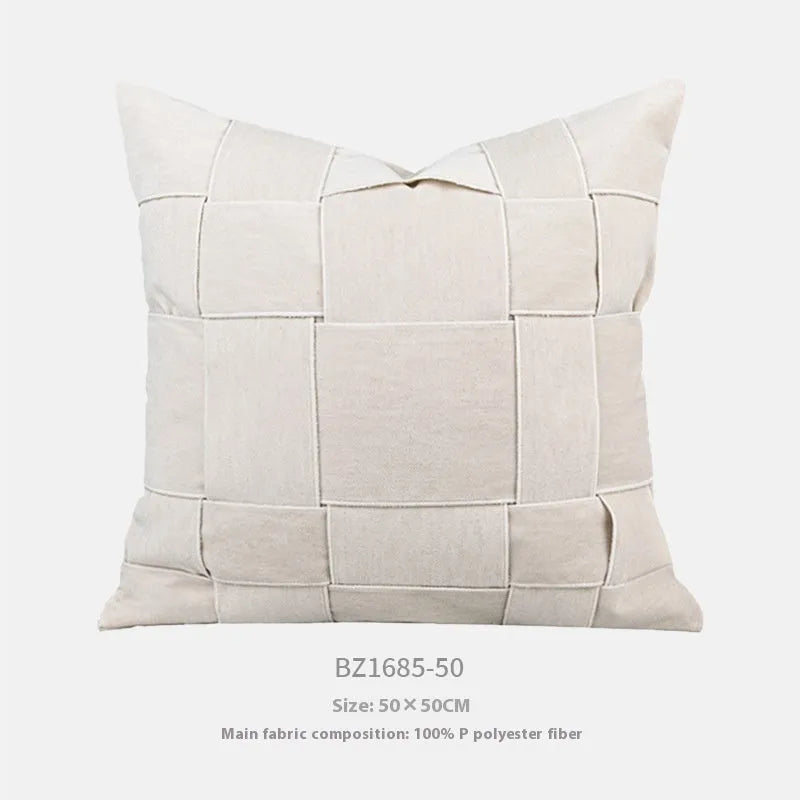 Square 50x50cm chenille woven cushion in a choice of colours like retro green or beige, shown on a sofa.