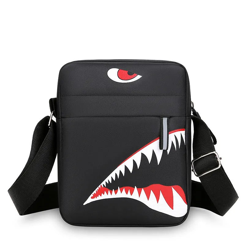 Men's small black Oxford cloth crossbody bag with an animal print pattern.