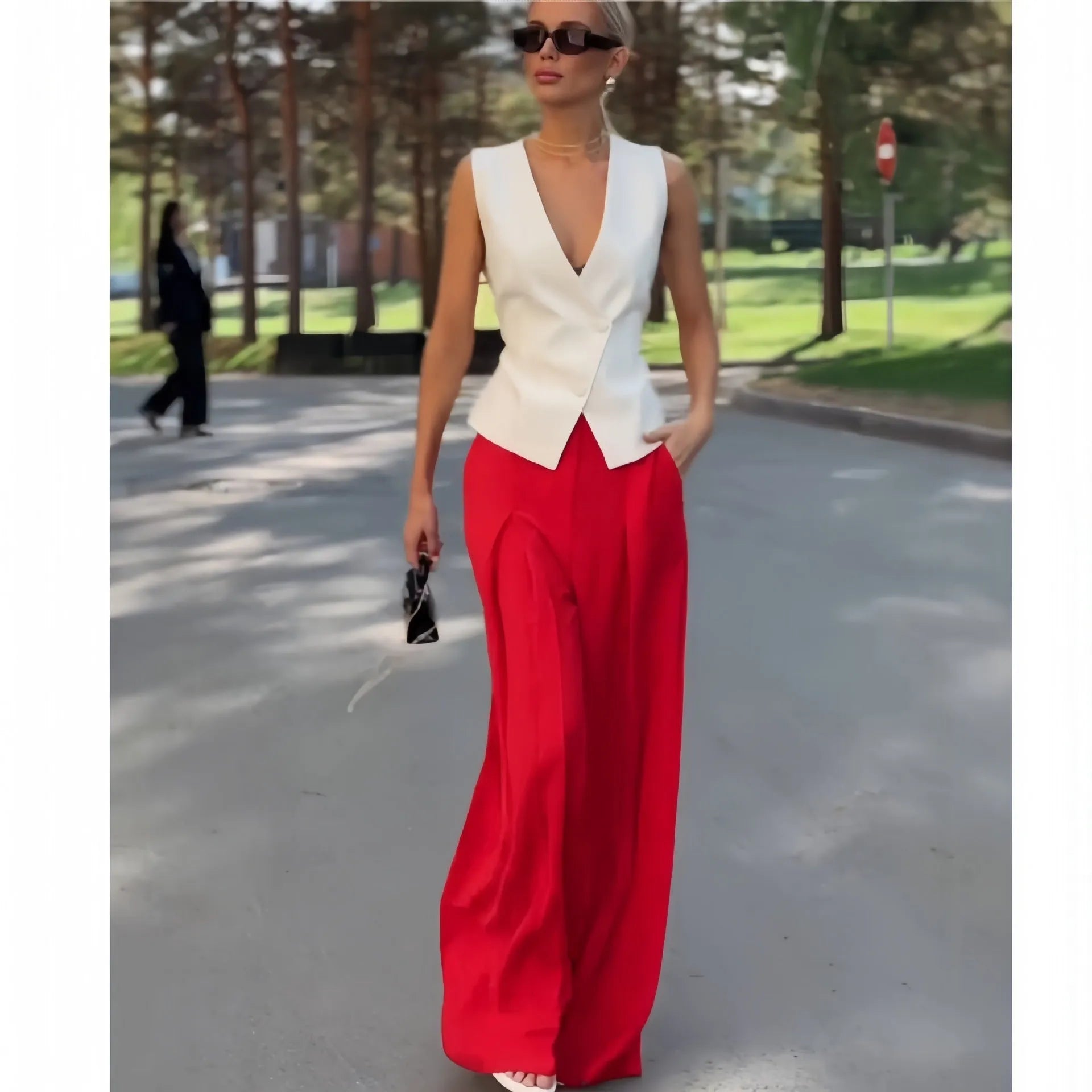Women's beige deep V-neck sleeveless top and wide leg trousers two-piece set