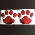 Hand-shaped brush outline car sticker with dog footprints, shown in black colour, measuring 7cm long.