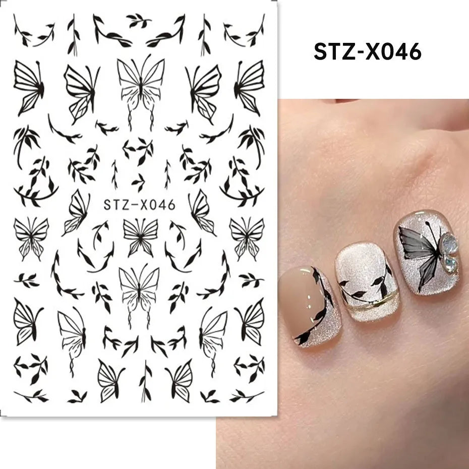 Cartoon love pattern nail art sticker decals in black and silver colours on a plastic sheet.